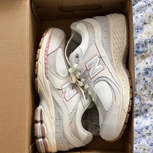 New Balance Women's Sneakers in Cream with Pink Accents